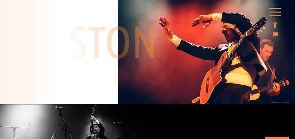 Concert live de STON avec guitare montrant une performance musicale sur scène avec éclairage artistique
